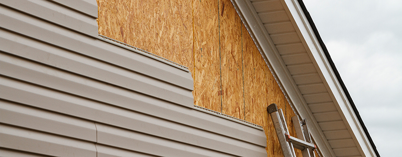 Siding being installed in Beresford, South Dakota.